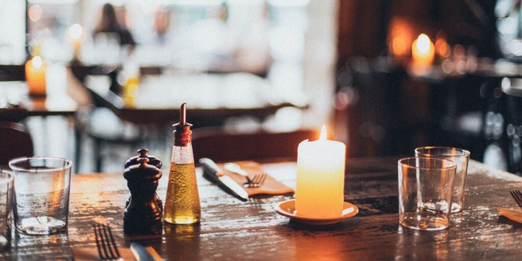 Table Top with candles and a cozy atmosphere. It looks like Fall or Winter vibes.
